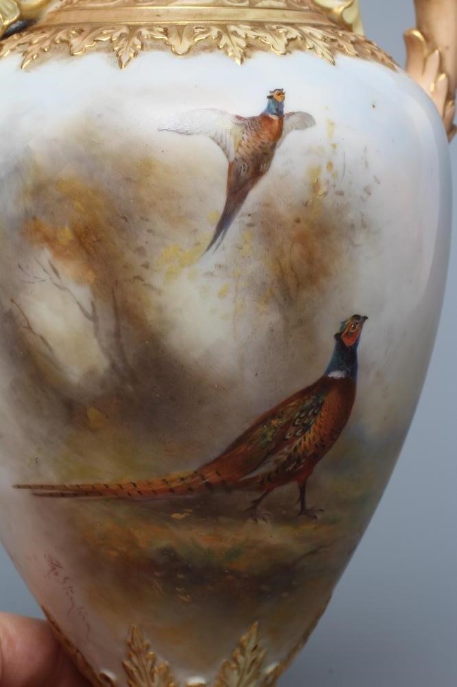 A ROYAL WORCESTER CHINA VASE AND COVER Image