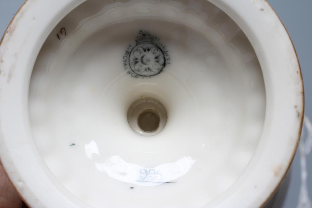 A ROYAL WORCESTER CHINA VASE AND COVER Image