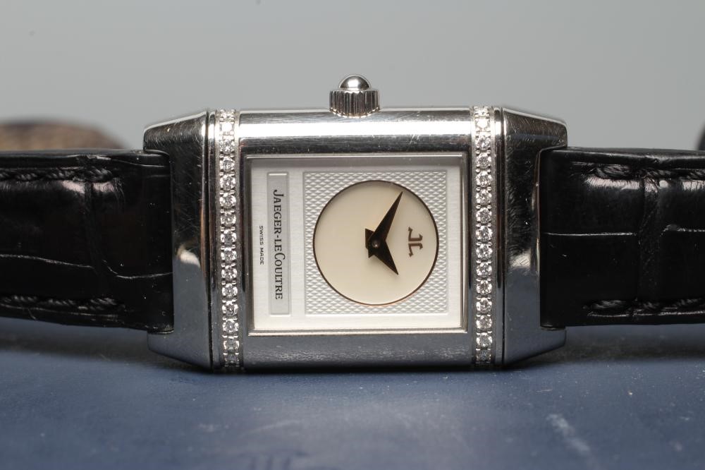A LADY'S JAEGER-LECOULTRE DIAMOND REVERSO WRISTWATCH Image