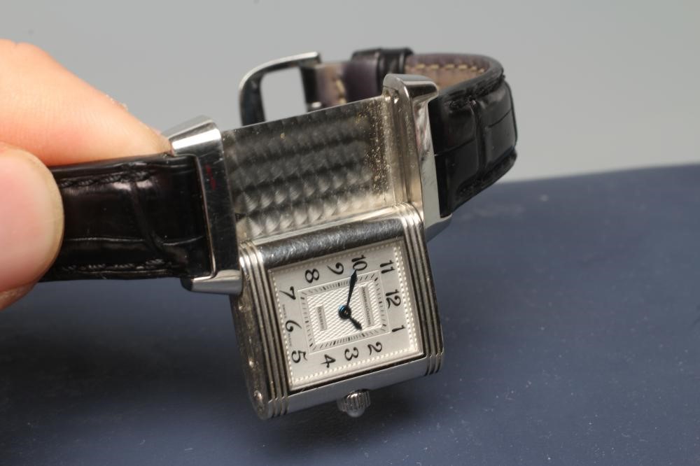 A LADY'S JAEGER-LECOULTRE DIAMOND REVERSO WRISTWATCH Image