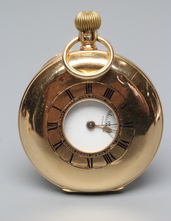 AN 18CT GOLD TOP WIND HALF HUNTER POCKET WATCH Image