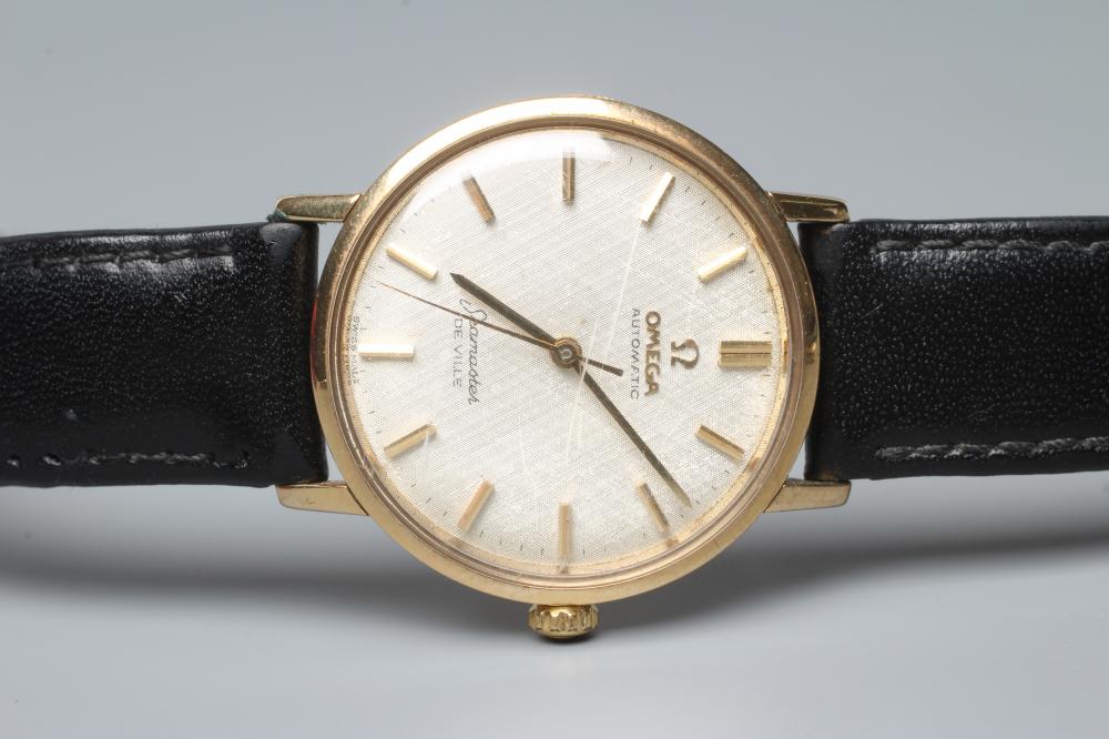 A GENTLEMAN'S 9CT GOLD OMEGA DE VILLE AUTOMATIC WRISTWATCH Image