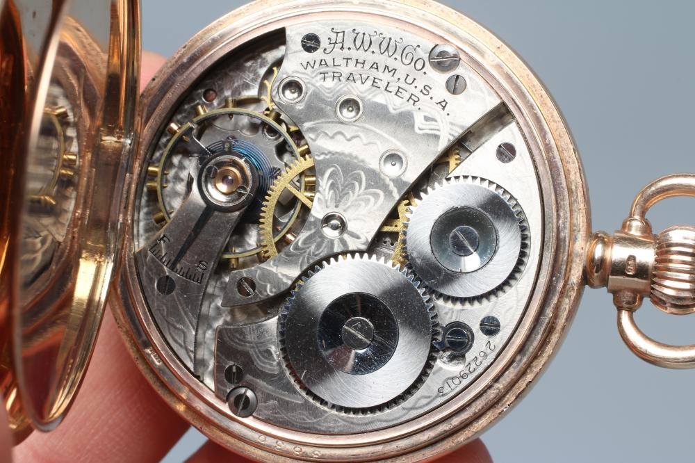 A 9CT GOLD WALTHAM TRAVELLER TOP WIND HALF HUNTER POCKET WATCH Image