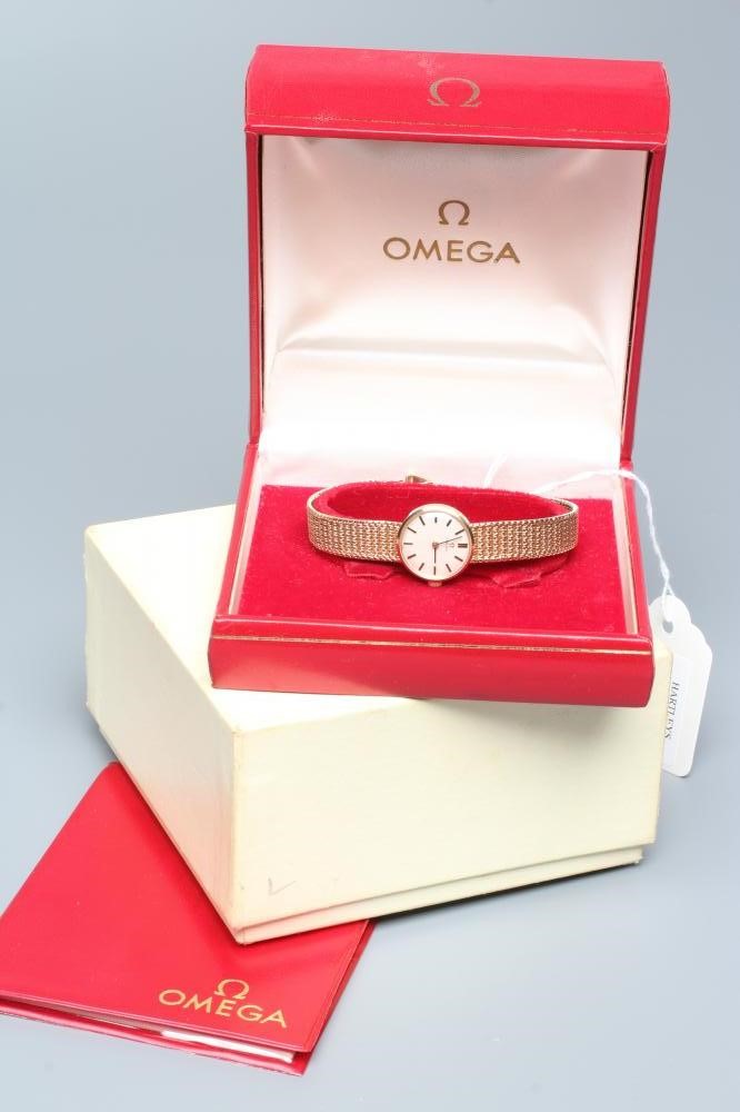 A LADY'S 9CT GOLD OMEGA WRISTWATCH Image
