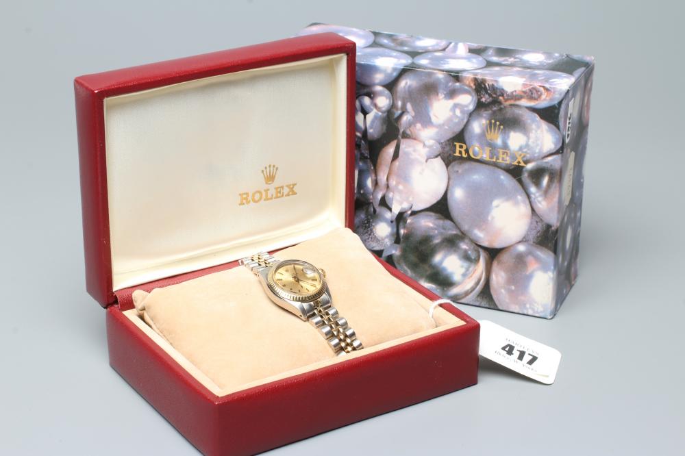 A LADY'S ROLEX OYSTER PERPETUAL DATE WRISTWATCH Image