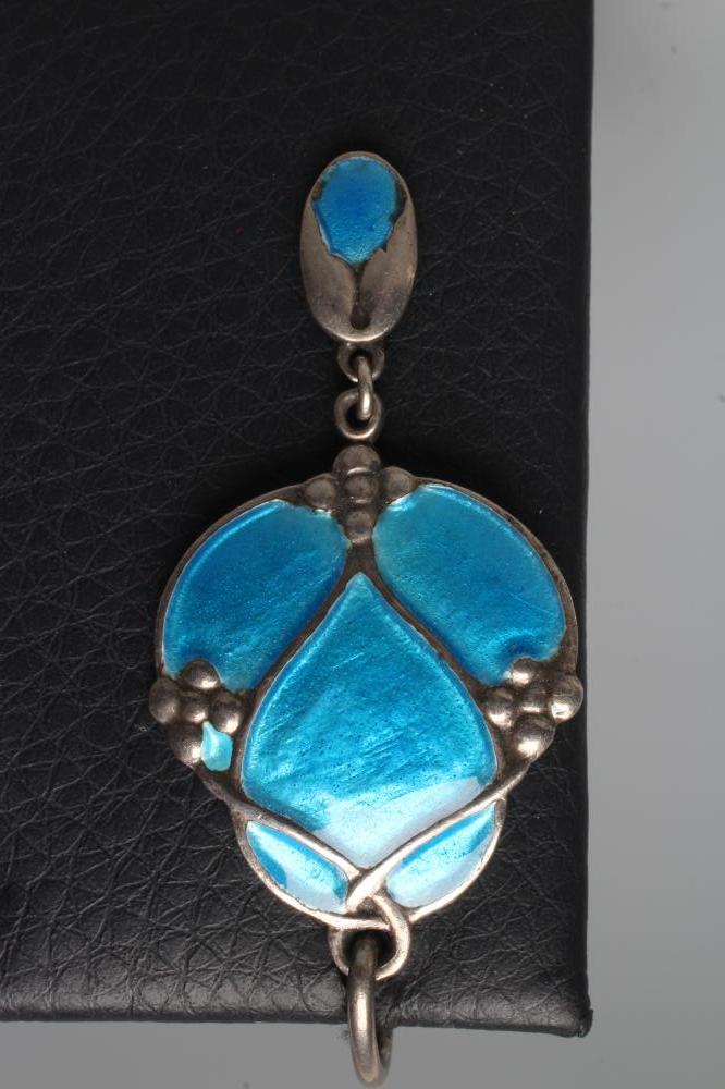 A MURRLE BENNETT PENDANT of trefoil form cast with three forget-me-nots and enamelled in blue Image