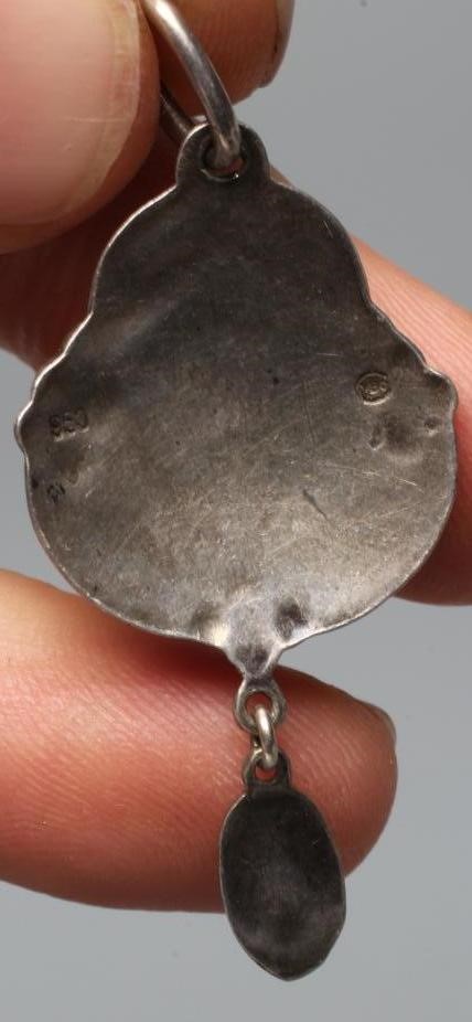 A MURRLE BENNETT PENDANT of trefoil form cast with three forget-me-nots and enamelled in blue Image