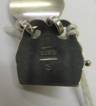 A BRACELET to match the previous lot, collet set with cabochon polished blue hardstones, stamped and Image