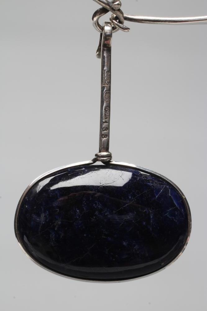 A GEORG JENSEN SILVER NECK RING designed by Vivianna Torun Bulow-Hube Image