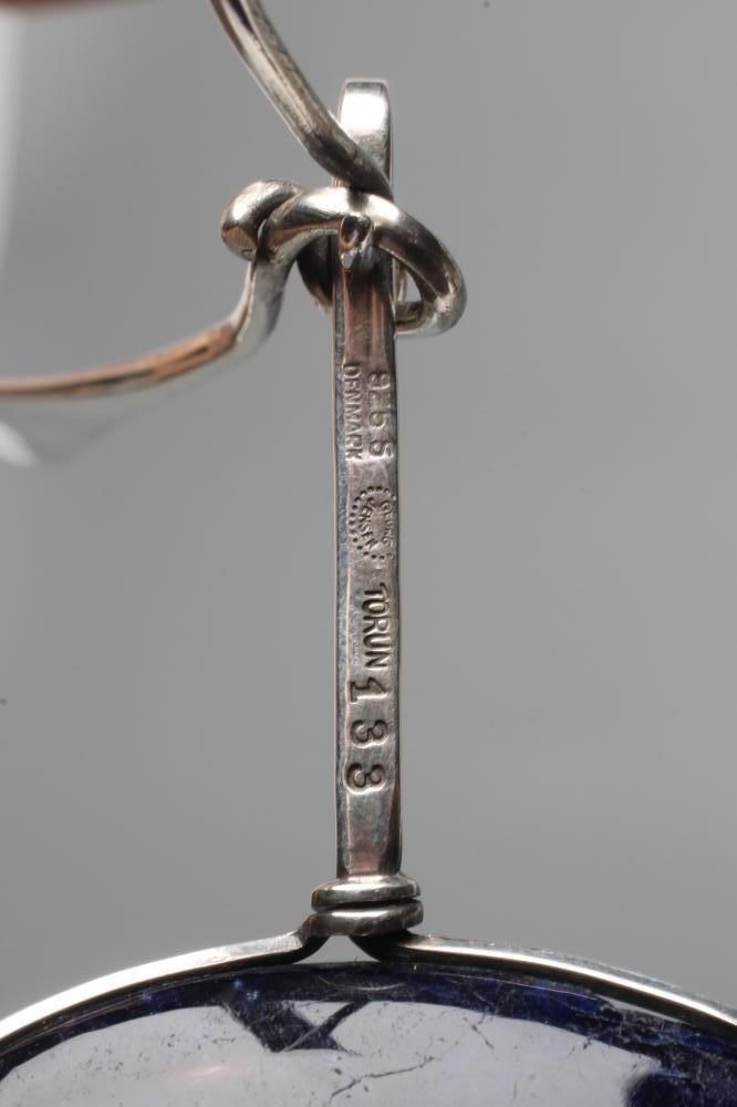 A GEORG JENSEN SILVER NECK RING designed by Vivianna Torun Bulow-Hube Image