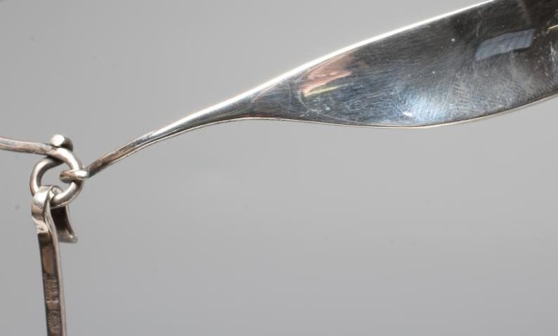 A GEORG JENSEN SILVER NECK RING designed by Vivianna Torun Bulow-Hube Image