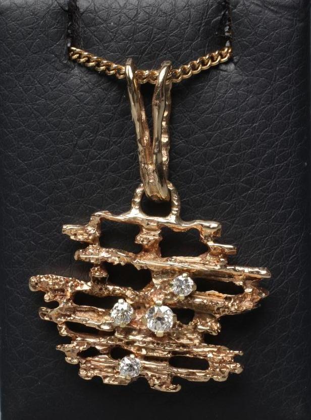 A BRUTALIST DIAMOND SET ABSTRACT PENDANT claw set with four graduated brilliant cut stones to Image