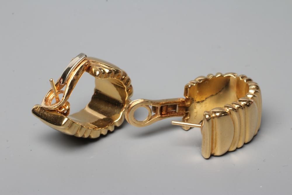 A PAIR OF CARTIER FRENCH CLIP HOOP EARRINGS, the wide panels with reeding, stamped Cartier, 1992, Image