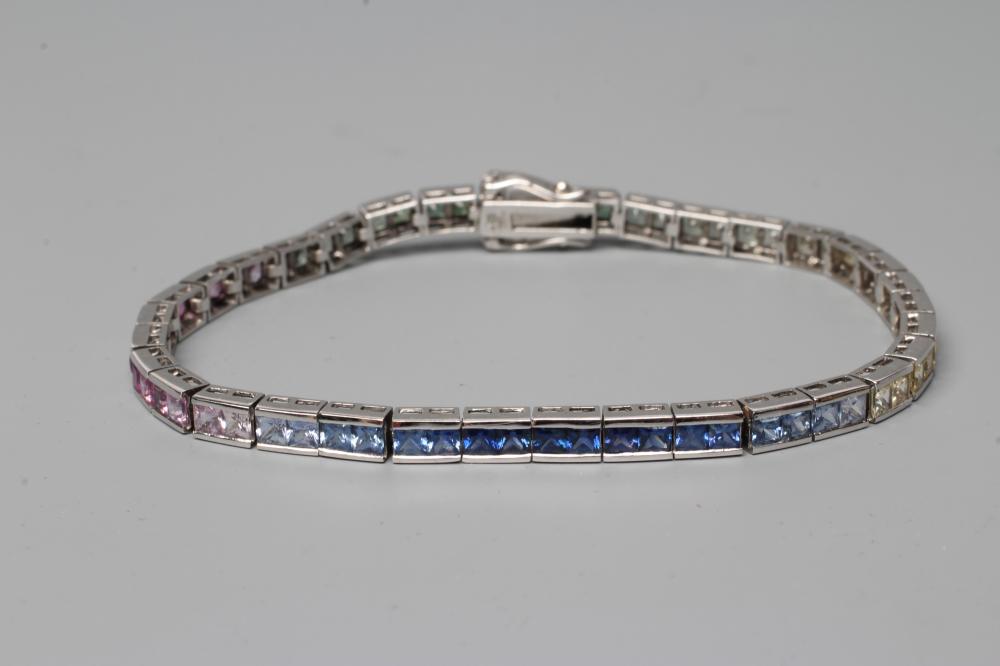 A RAINBOW SAPPHIRE TENNIS BRACELET Image