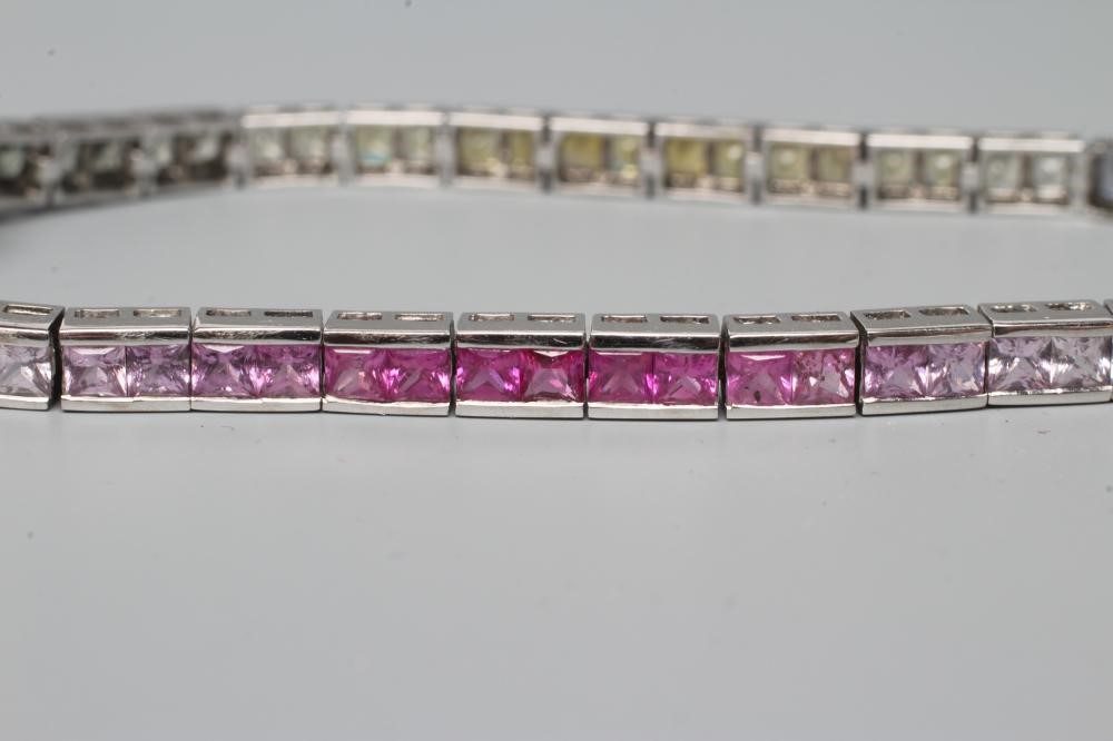 A RAINBOW SAPPHIRE TENNIS BRACELET Image
