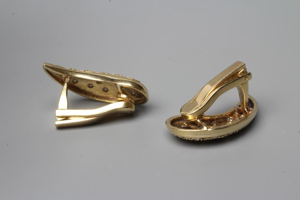 A PAIR OF DIAMOND CLIP EARRINGS, the pointelle coma shaped panels pave set with scattered small Image