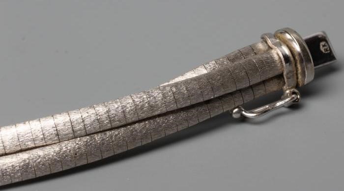 A MATT EFFECT WHITE TRIPLE STRAND SQUARE LINK BRACELET, with slide fastener, stamped 585, 24.7g Image