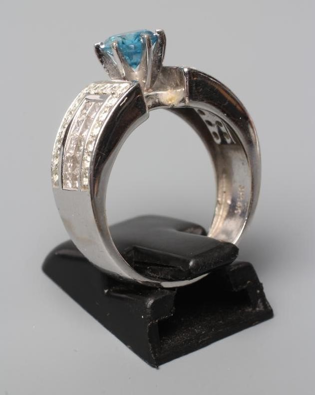 A BLUE AND WHITE DIAMOND COCKTAIL RING Image