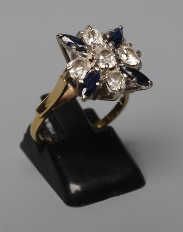 A SAPPHIRE AND DIAMOND DRESS RING Image