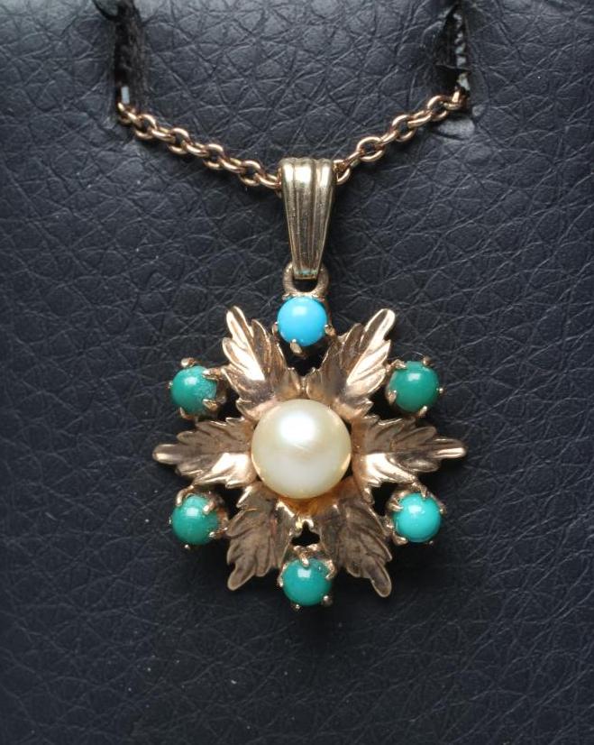A PEARL AND TURQUOISE PENDANT, the central cultured pearl cup set to a flowerhead with six turquoise Image