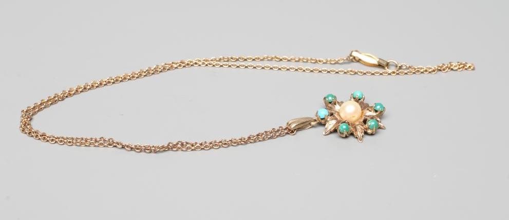A PEARL AND TURQUOISE PENDANT, the central cultured pearl cup set to a flowerhead with six turquoise Image