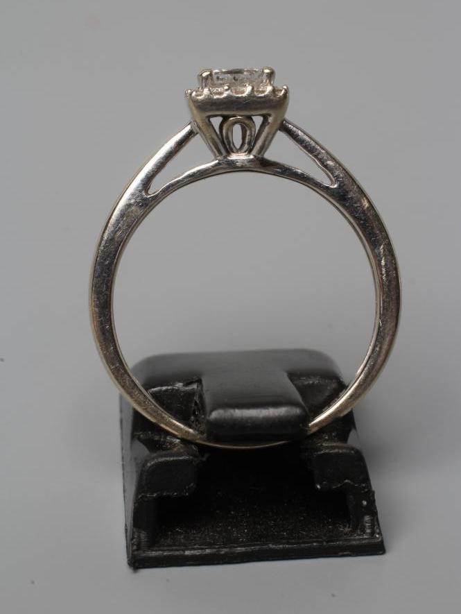 A DIAMOND CLUSTER RING Image