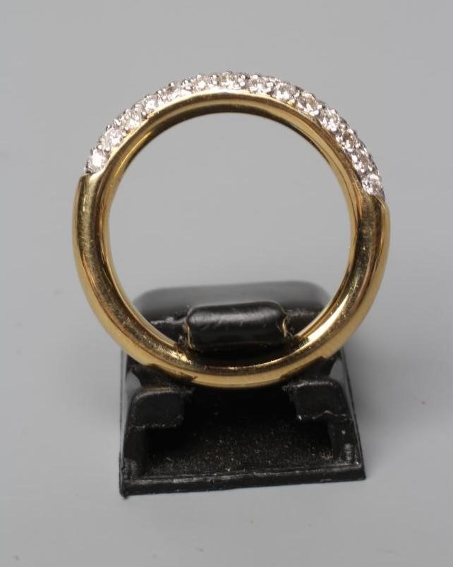 A THREE ROW DIAMOND HALF HOOP ETERNITY RING, stamped 750, 18k, size K (Est. plus 24% premium inc. Image