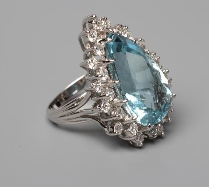 AN AQUAMARINE AND DIAMOND COCKTAIL RING Image