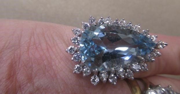 AN AQUAMARINE AND DIAMOND COCKTAIL RING Image