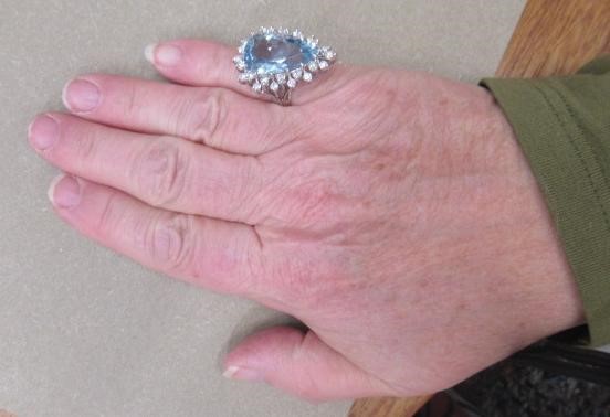 AN AQUAMARINE AND DIAMOND COCKTAIL RING Image