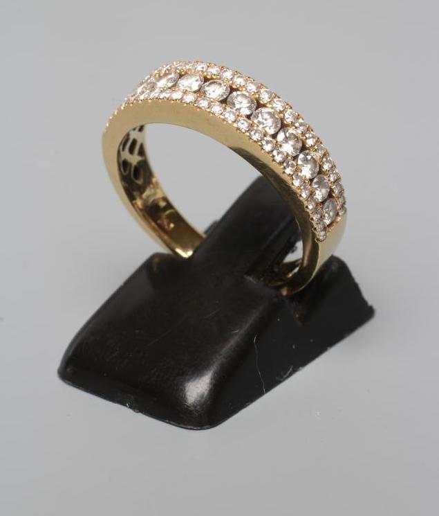 A DIAMOND HALF HOOP ETERNITY RING Image