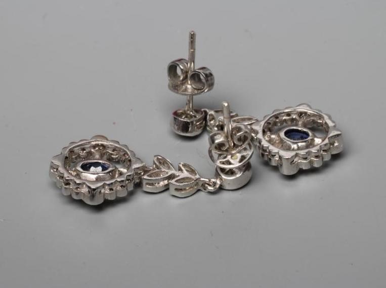 A PAIR OF EDWARDIAN STYLE SAPPHIRE AND DIAMOND DROP EARRINGS Image