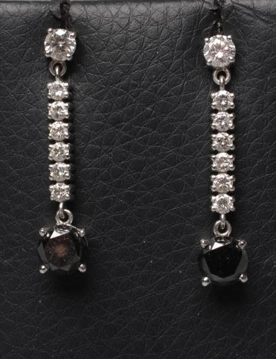 A PAIR OF DIAMOND DROP EARRINGS Image
