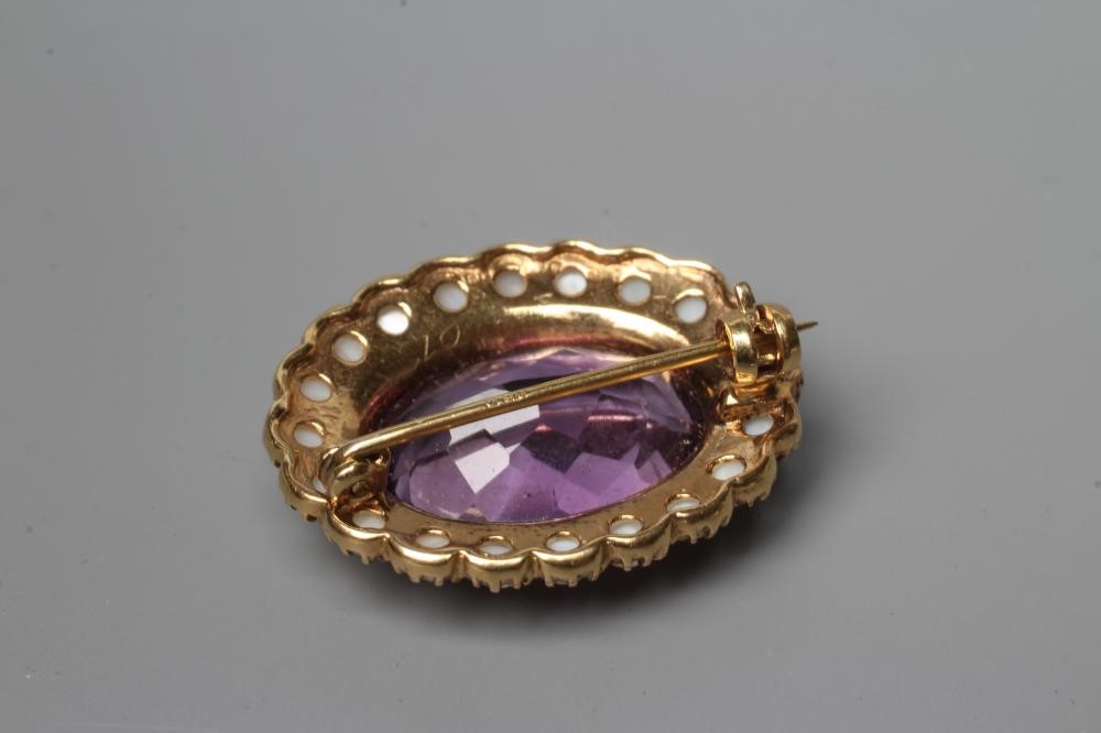AN AMETHYST AND PEARL BROOCH, the oval facet cut amethyst claw set to a border of cultured pearls in Image