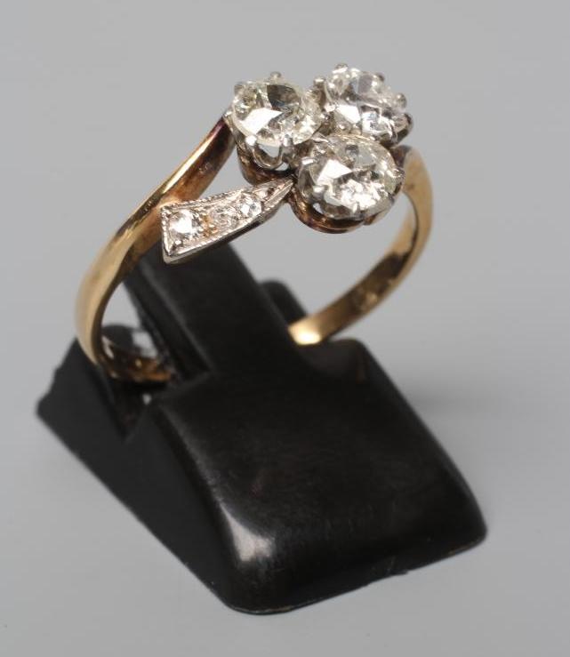 A THREE STONE DIAMOND RING Image