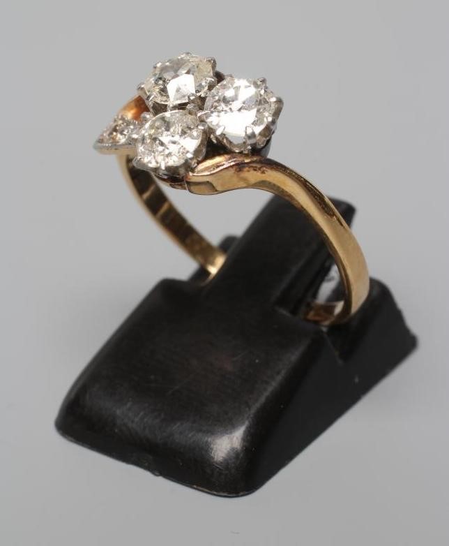 A THREE STONE DIAMOND RING Image