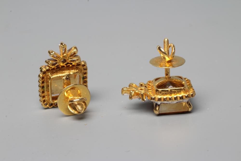 A PAIR OF EDWARDIAN STYLE EAR STUDS Image