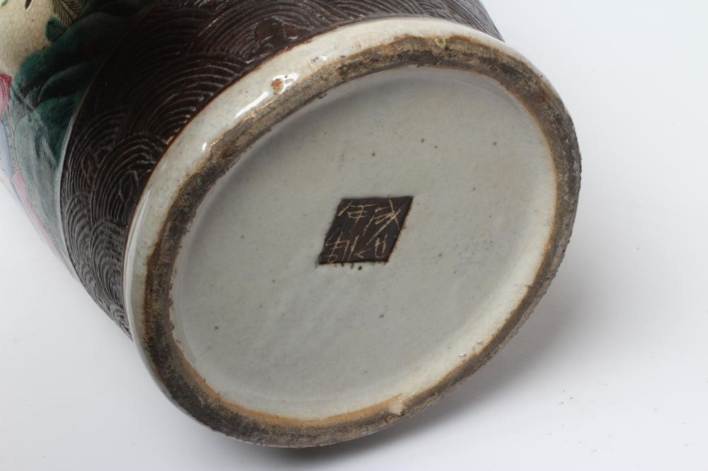 A CHINESE ALCOVE VASE of rouleau form with shi-shi handles and applied salamanders to the shoulders Image