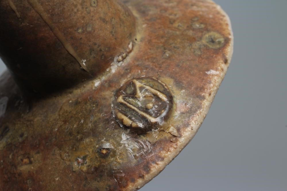 JOHN MALTBY (1936-2000) - a brown glazed stoneware stylised bird pricket candlestick, monogrammed Image