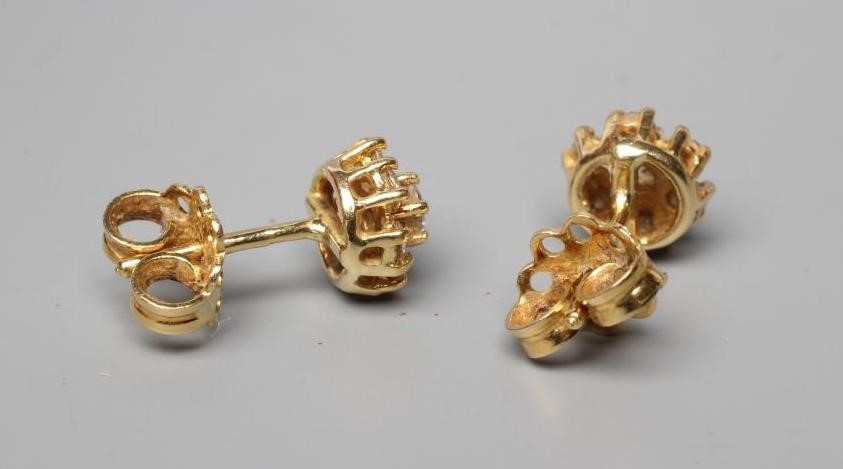 A PAIR OF DIAMOND CLUSTER EAR STUDS, stamped 18ct (Est. plus 24% premium inc. VAT) Image