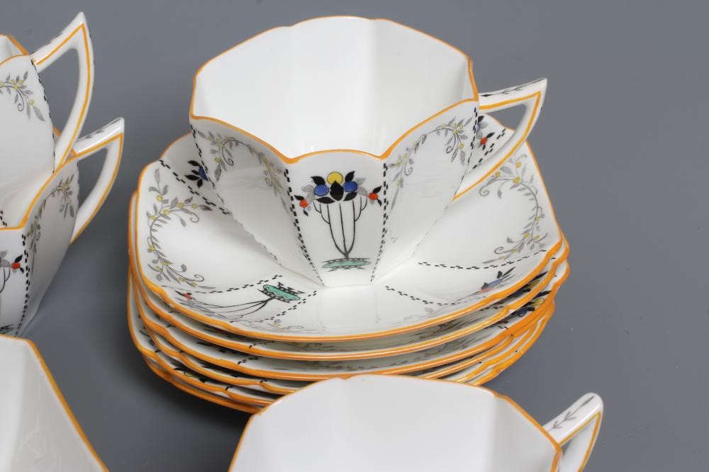AN ART DECO SHELLEY CHINA QUEEN ANNE TEA SERVICE printed and overpainted with the "Red Daisy" Image