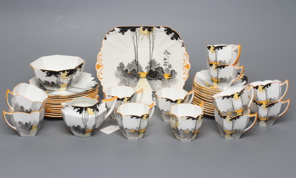 AN ART DECO SHELLEY CHINA QUEEN ANNE TEA SERVICE printed and overpainted with the Tall Trees at Image