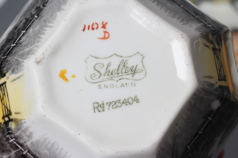 AN ART DECO SHELLEY CHINA QUEEN ANNE TEA SERVICE printed and overpainted with the Tall Trees at Image