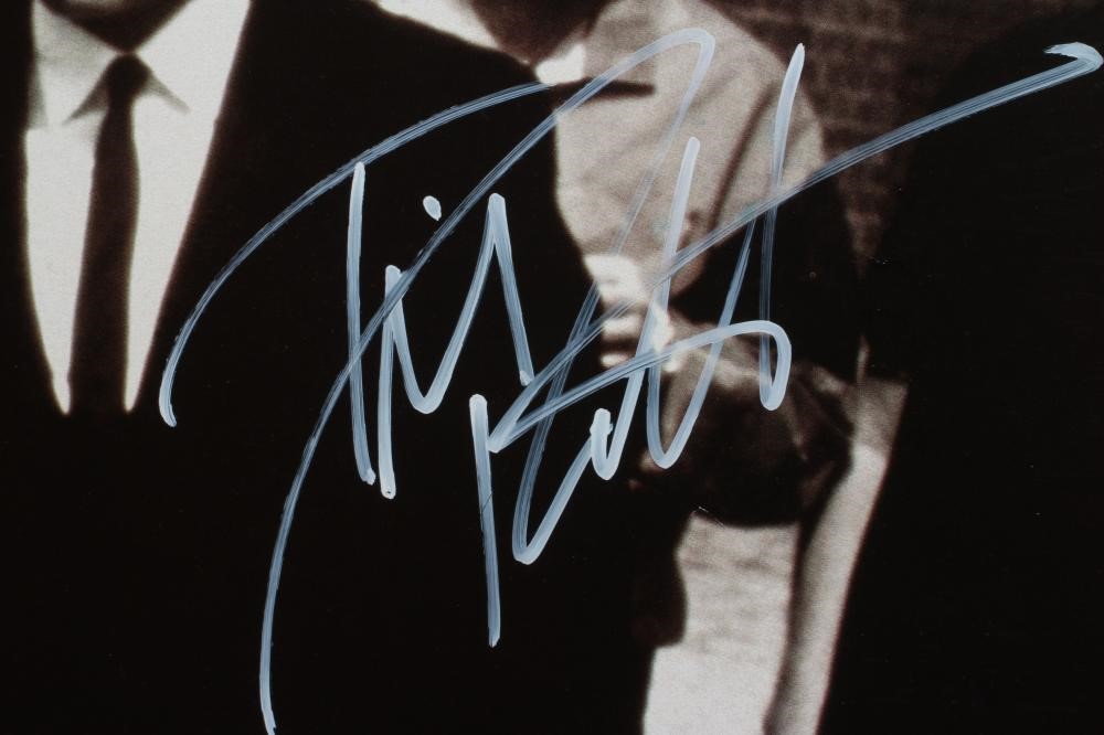 A SIGNED "RESERVOIR DOGS" POSTER autographed by Quentin Tarantino Image