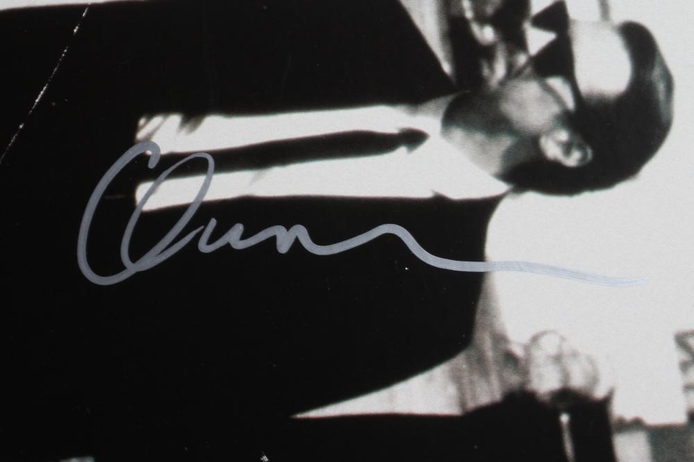 A SIGNED "RESERVOIR DOGS" POSTER autographed by Quentin Tarantino Image