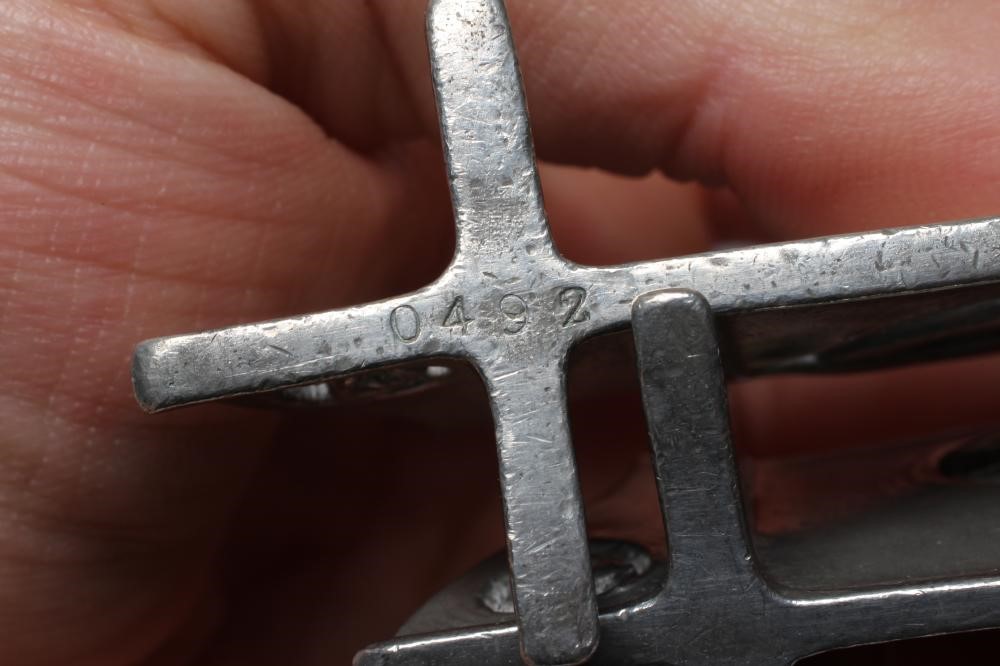 ARCHIBALD KNOX FOR LIBERTY - a pair of pewter knife rests, of oblong form and pierced with Image