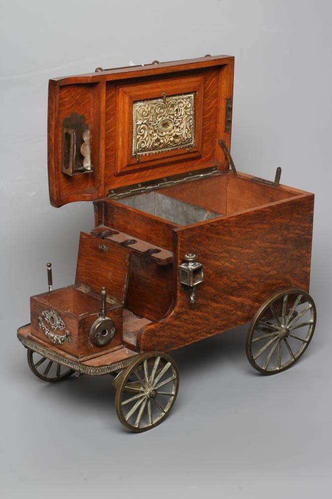 AN EDWARDIAN OAK NOVELTY SMOKERS COMPANION Image