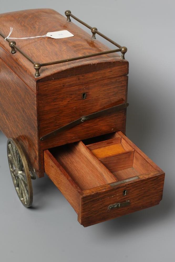 AN EDWARDIAN OAK NOVELTY SMOKERS COMPANION Image