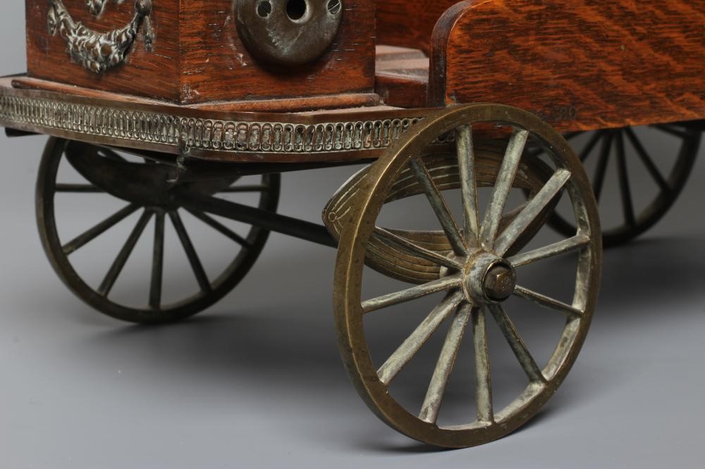 AN EDWARDIAN OAK NOVELTY SMOKERS COMPANION Image