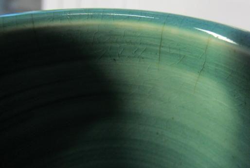 A RUSKIN VASE, early 20th century, of globular form with garlic type neck, the streaky blue souffle Image